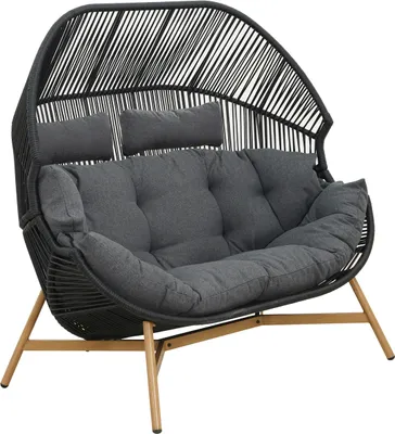 A two-seater outdoor chair with a woven rattan-like frame and dark gray cushions, set against a white background.