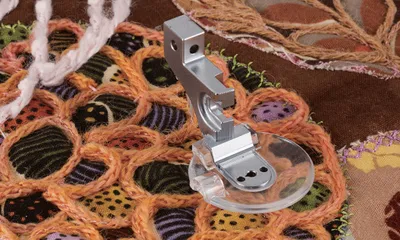 Immagine prodotto di Piedino per cordoncini Brother F073