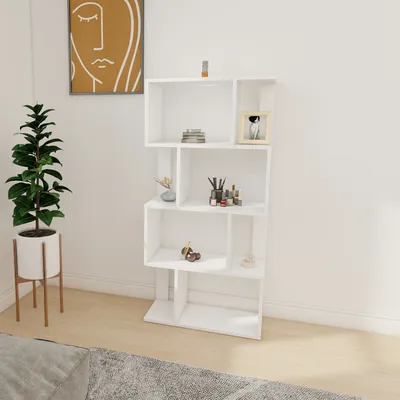 A white bookshelf with various items on its shelves, placed in a room with a plant and artwork.