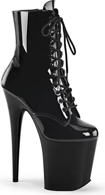 A single black patent leather ankle boot with a high platform and stiletto heel, shown from a side-diagonal angle against a white background.