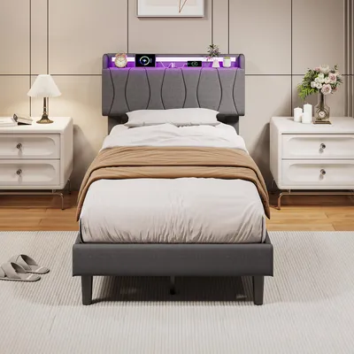 Immagine prodotto di Letto singolo UnboxG, 90x200 cm, grigio, rivestito in lino, con testiera contenitore, illuminazione RGB a LED, prese USB e Type-C, 18 cm di spazio sotto il letto e rete a listelli