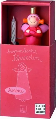 A product box containing a candle holder figurine and a candle.
