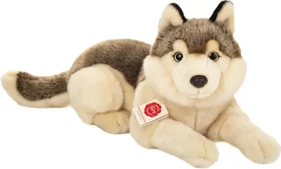 A plush toy wolf lying down, presented on a white background.