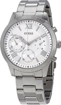 A studio shot of a silver Guess watch with a white face.