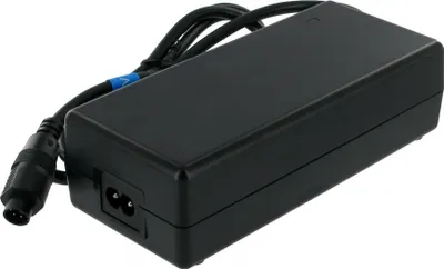 A black power adapter with cables and connectors.