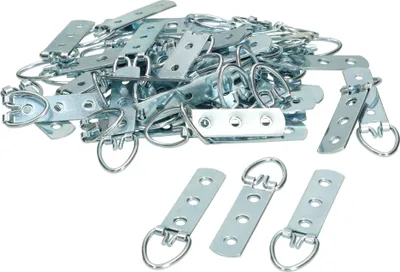 A pile of metal picture hanging D-rings and a few individual ones in the foreground, all on a white background.