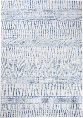 A close-up view of a rug with a geometric pattern.