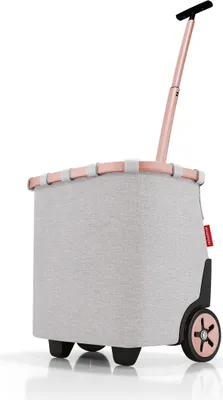 A shopping trolley with a rose gold handle and frame, and a gray fabric bag.