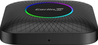 A black electronic device with a circular LED light ring on top.
