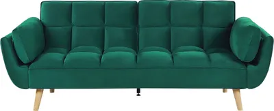A green velvet sofa with tufted cushions and wooden legs, presented against a white background.