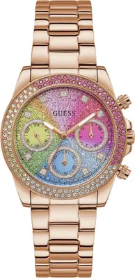 A rose gold Guess women's watch with a colorful, glittery dial and a diamond-encrusted bezel.
