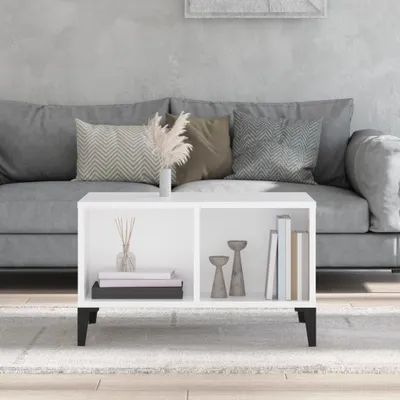 A living room scene with a sofa and a coffee table.