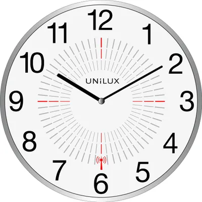 A white analog wall clock with black numbers and hands, and a silver frame.