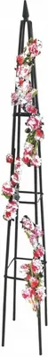 A black metal garden obelisk decorated with artificial pink and red roses and green leaves, set against a white background.