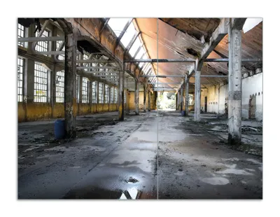 Produktbild von Wallario Herdabdeckplatte aus Glas, Größe 70 x 52 cm 2-teilig, Motiv Alte Industriehalle  leerstehend und einsam