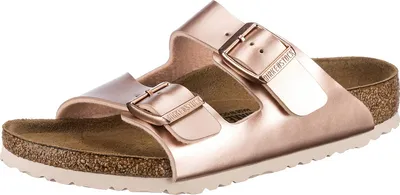 A pair of rose gold Birkenstock Arizona sandals shown from a slightly elevated side angle against a white background.