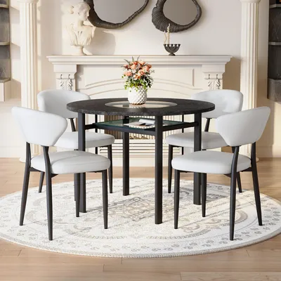 Produktbild von STILVORA Esstisch-Set rund mit 4 Sesseln aus PolyurethanMaterial und Komfort-Rückenlehne, Rundtisch 100 cm in schwarzer Holzoptik, Essgruppe für Wohnzimmer, Schwarz und Weiß
