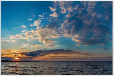 Produktbild von Wallario Wandbild Sonnenuntergang über einem Fluss, Größe: 61 x 91,50 cm, Poster mit weißem Aluminiumrahmen