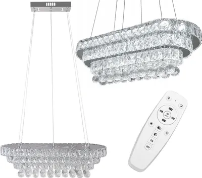 A product shot of a crystal chandelier and a remote control against a white background.