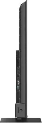 Side view of a black television on a stand.