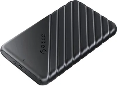 A black ORICO external hard drive enclosure is shown from a diagonal top-down perspective on a white background.