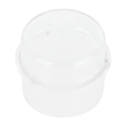 A clear plastic lid for a kitchen appliance.