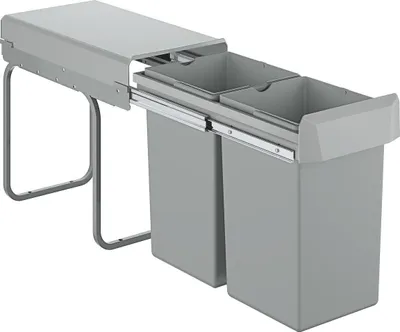 A pull-out trash bin system with two compartments.