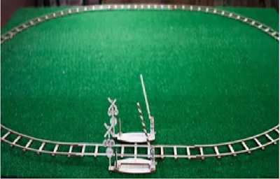 Produktbild von Wooden.City Holz Eisenbahn - runde Schienen mit Bahnübergang Puzzle