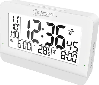 A white digital alarm clock with a large display showing the time, date, temperature, and alarm settings.