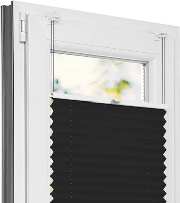 A close-up view of a black pleated blind installed in a white window frame.