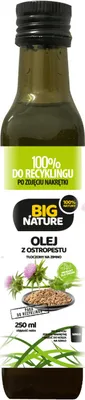 A bottle of oil with a label.