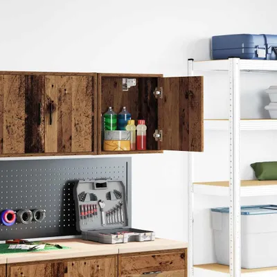 A garage or workshop setting with wall-mounted cabinets and shelving.