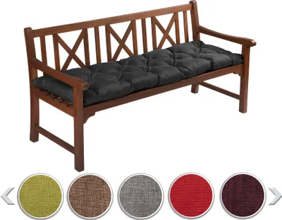 A wooden bench with a black cushion on it, with color swatches below.