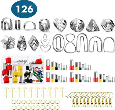 A collection of polymer clay cutters, tools, and earring findings.