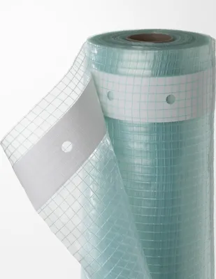 A roll of greenhouse film with a grid pattern and white tape strips.