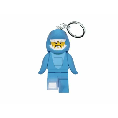 A blue LEGO minifigure keychain in a shark costume is shown against a white background.