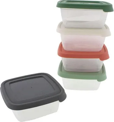 A stack of clear plastic food storage containers with colored lids, and one container with a black lid in the foreground.