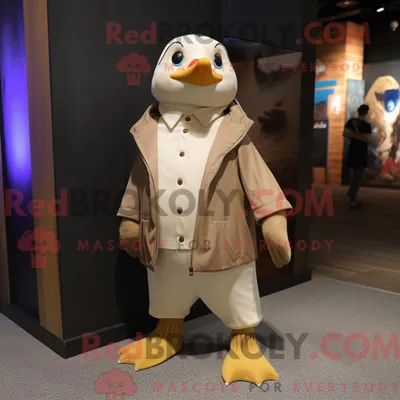 Produktbild von Tan REDBROKOLY Pinguin Maskottchen Kostüm Charakter gekleidet mit einer Jacke und Fußkettchen
