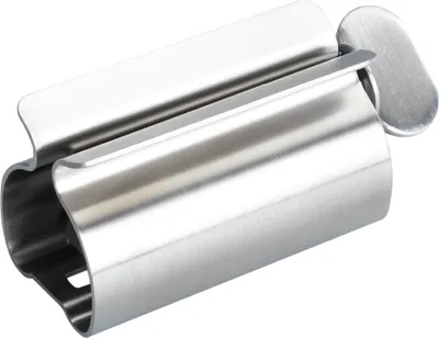 A close-up studio shot of a stainless steel tube squeezer.