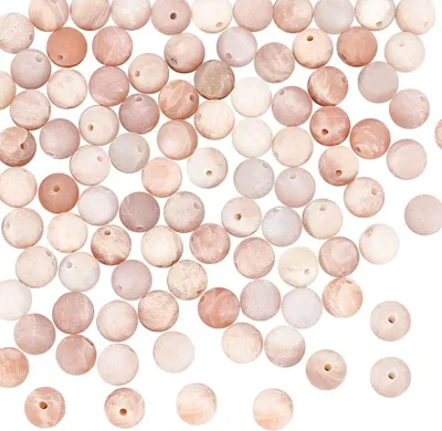 Productafbeelding van 100 ronde, oranje-rode "zonsteen" kralen van 6 mm voor het maken van sieraden, knutselprojecten en doe-het-zelfwerk