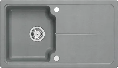 A top-down view of a gray granite kitchen sink with a drain and a drying area.