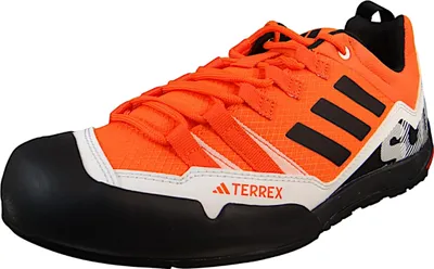 A single orange Adidas Terrex hiking shoe is shown from a side angle against a white background.