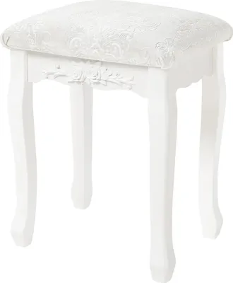 A white vanity stool with a patterned seat.