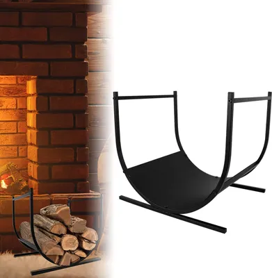 A black metal firewood rack is shown against a white background, with a partial view of a brick fireplace and logs on the left side of the image.