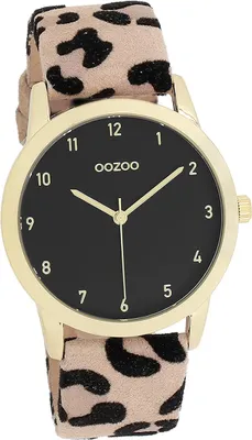 A close-up studio shot of a women's wristwatch.