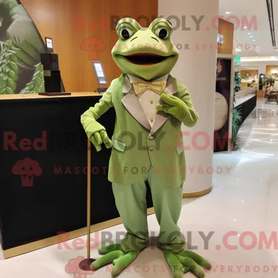 Produktbild von Maskottchen REDBROKOLY eines braunen Frosches mit Abendkleid und Anstecknadeln