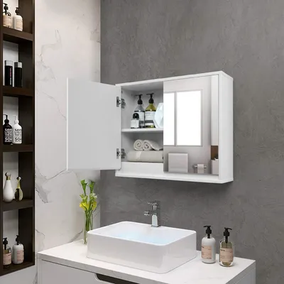 A bathroom scene with a sink, faucet, and a wall-mounted cabinet with a mirror.
