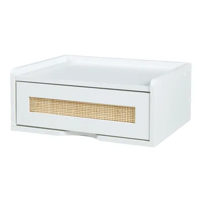 A white wall shelf with a cane drawer front.