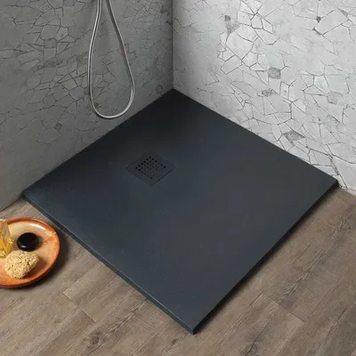 A modern shower tray in a bathroom setting.