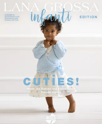 A young child modeling a knitted cardigan and dress.